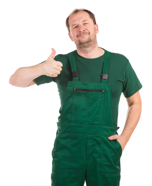 Worker in green overalls. — Stock Photo, Image