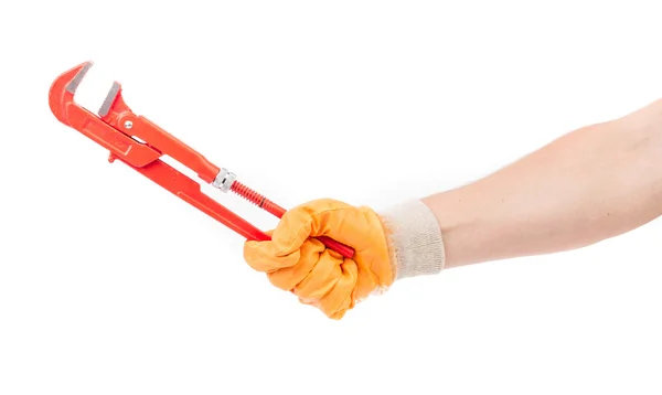 Hand in gloves holding gas wrench. — Stock Photo, Image