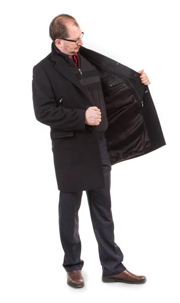 Muž v dlouhém černém kabátě. — Stock fotografie