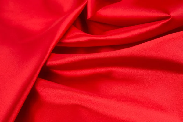 赤いシルクの織物生地を使用。クローズ アップ. — ストック写真
