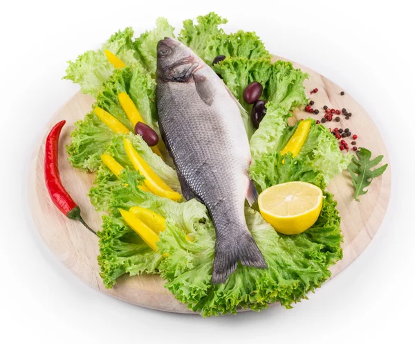 Composition of fresh seabass and vegetables. — Stock Photo, Image