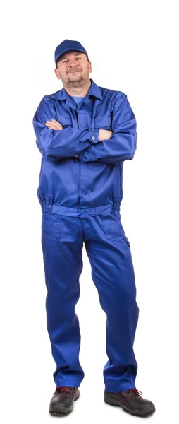 Man in working clothes crossed arms. — Stock Photo, Image