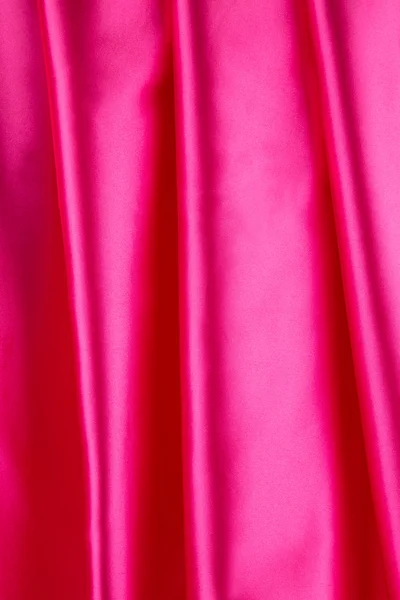 褶皱的粉红色丝绸布料纹理. — 图库照片