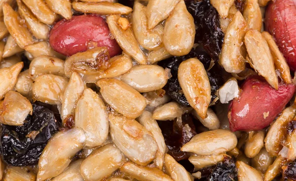 Candied roasted peanuts sunflower seeds. — Stock Photo, Image