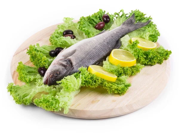 Fresh seabass and vegetables. — Stock Photo, Image