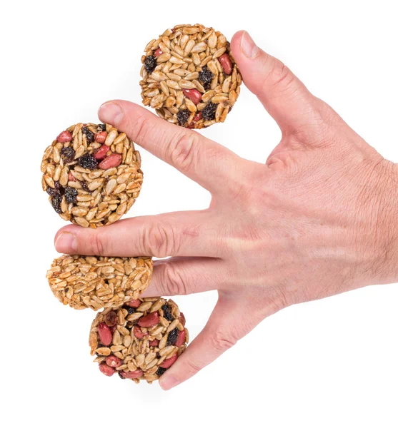 Candied roasted peanuts seeds in hand. — Stock Photo, Image