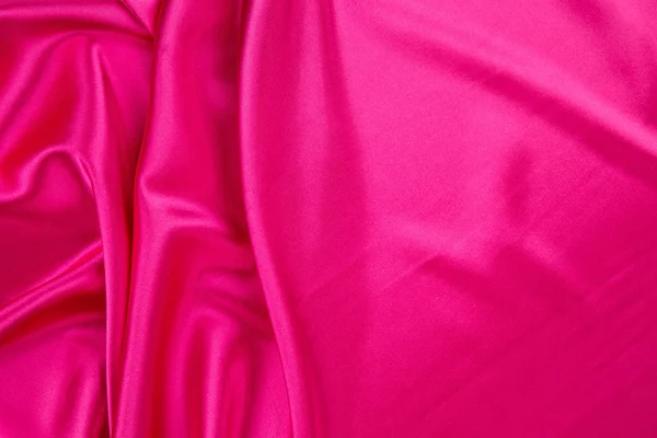 Textura de pano de seda rosa . — Fotografia de Stock