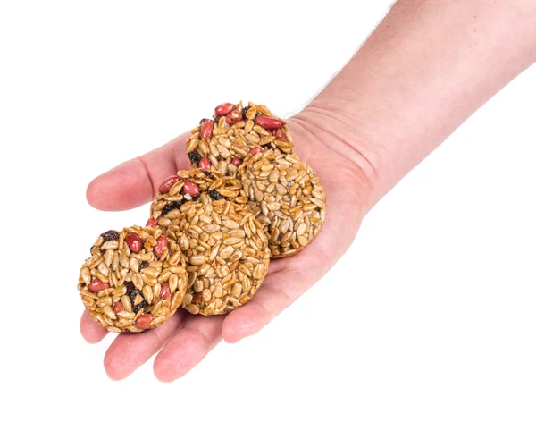 Amendoins torrados cristalizados sementes de girassol na mão . — Fotografia de Stock