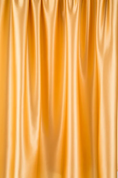Golden silk drapery. — Stock Photo, Image