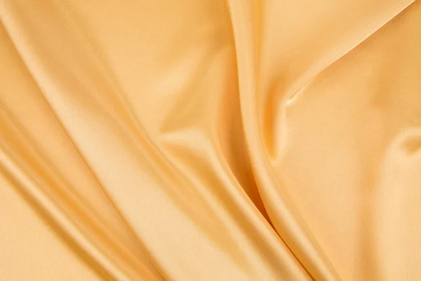 Golden silk drapery. — Stock Photo, Image