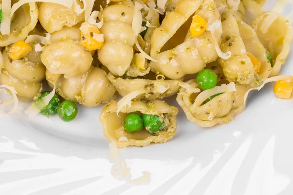 Pasta with green peas and corn. — Stock Photo, Image
