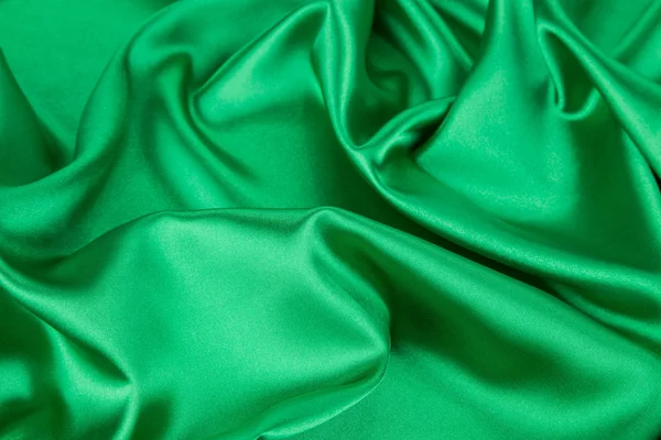 Green silk drapery  background. — Stock Photo, Image