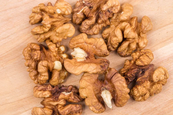 Walnut kernels as background. — Stock Photo, Image