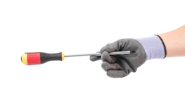 Hand in glove holds screwdriver. — Stock Photo, Image