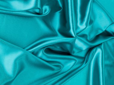 Mavi ipek kumaştan.