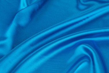 Mavi ipek kumaş kıvrımları