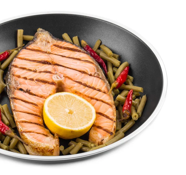 Frying pan with salmon steak. — Stock Photo, Image