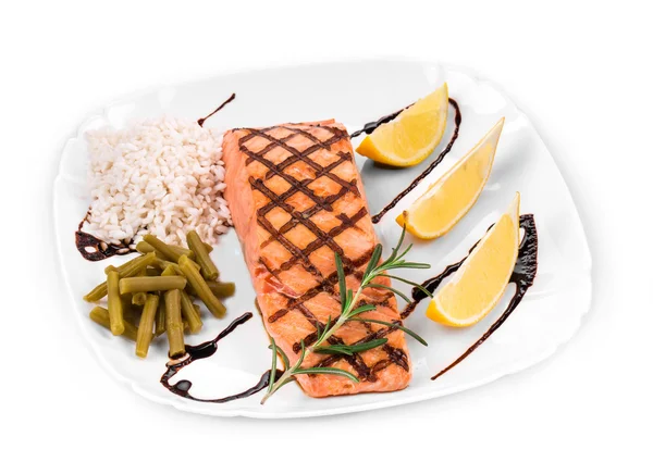 Roasted salmon fillet on white plate — Stock Photo, Image
