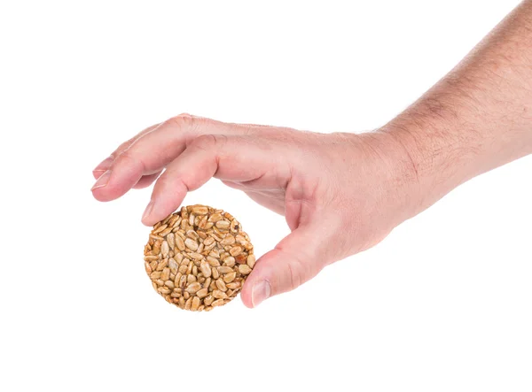 Candied roasted peanuts seeds in hand. — Stock Photo, Image