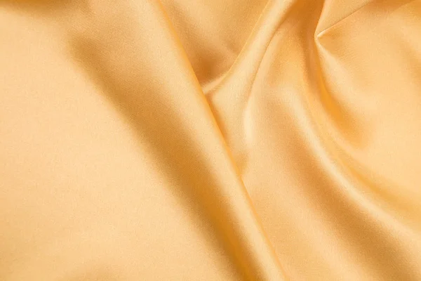 Golden silk drapery. — Stock Photo, Image