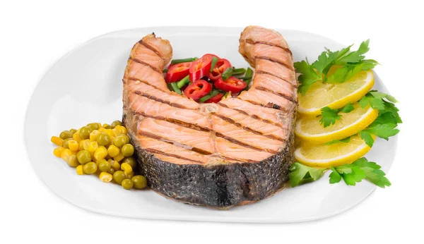 Salmon steak with vegetables, lemon — Stock Photo, Image