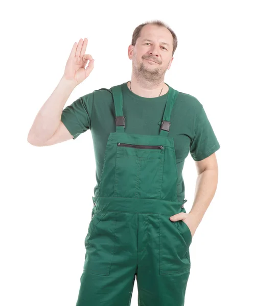 Worker in green overalls. — Stock Photo, Image