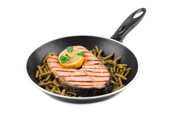 Salmon steak, lemon, asparagus — Stock Photo, Image