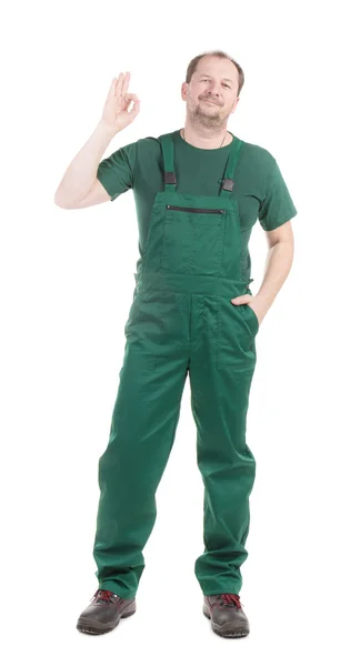 Worker in green overalls — Stock Photo, Image