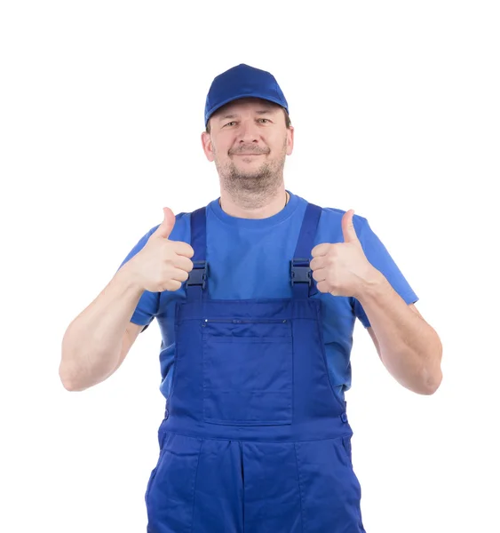 Man in blue overalls — Stock Photo, Image