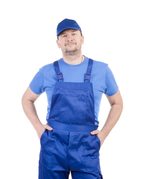 Man in blue overalls. — Stock Photo, Image