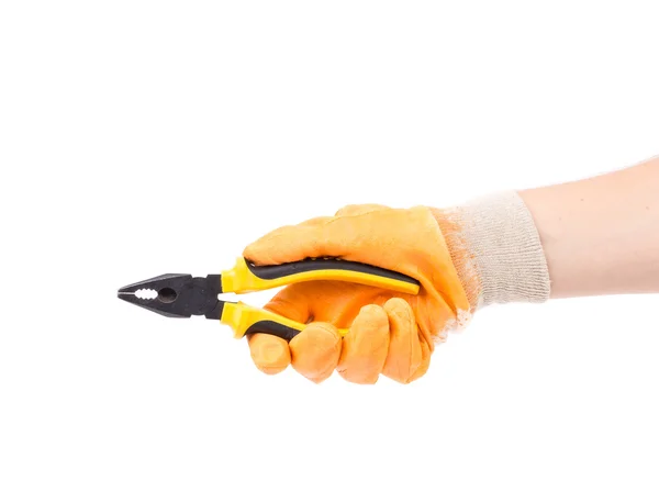 Hand in gloves holding pliers. — Stock Photo, Image