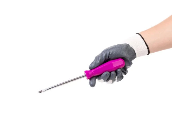 Ręka z fioletowy śrubokręt. — Zdjęcie stockowe
