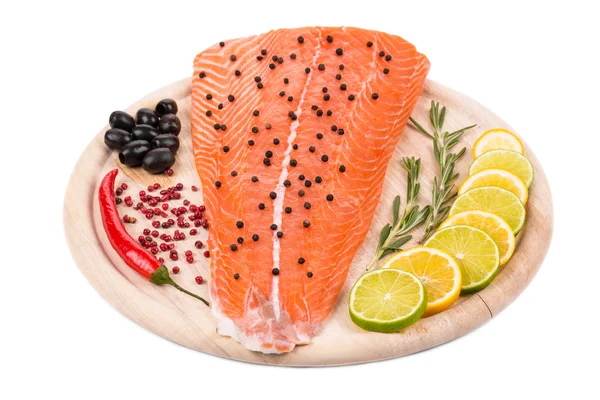 Salmon fillet with pepper, citrus, peppers and olives — Stock Photo, Image