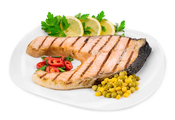 Salmon steak with vegetables and lemon — Stock Photo, Image