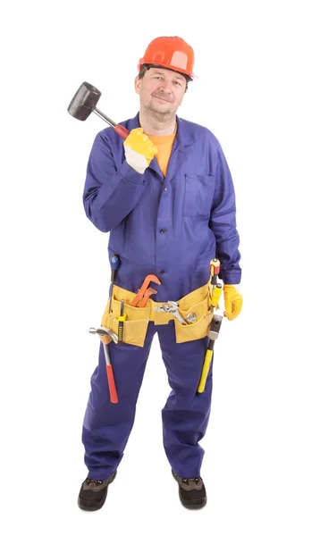 Trabajador en sombrero duro sostiene martillo . —  Fotos de Stock