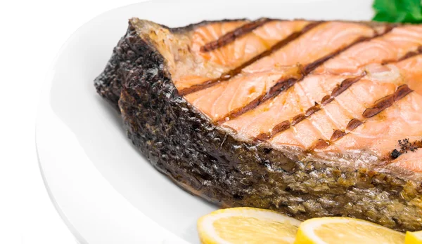 Salmon steak with lemon — Stock Photo, Image