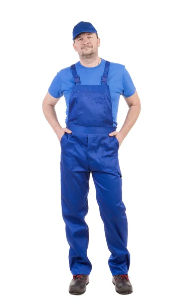 Εργαζόμενος με μπλε φόρμες — Φωτογραφία Αρχείου