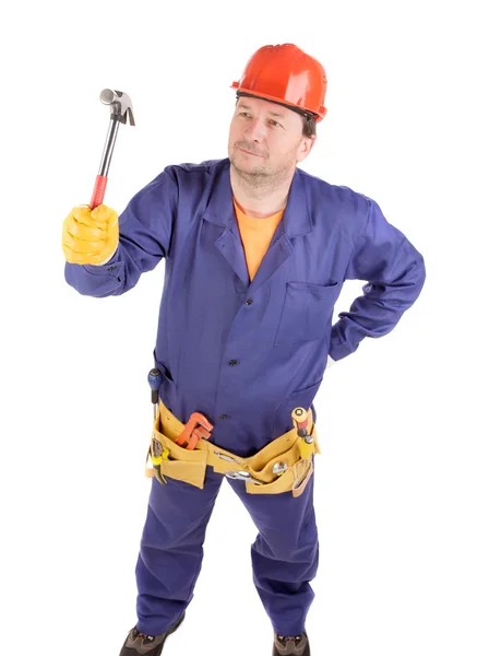 Trabajador en casco con un martillo — Foto de Stock