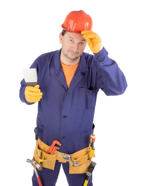 Trabajador en gorro duro sosteniendo espátula . —  Fotos de Stock