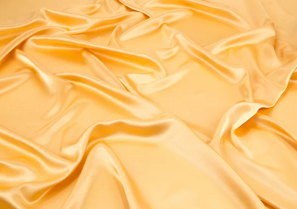 Golden silk drapery. — Stock Photo, Image