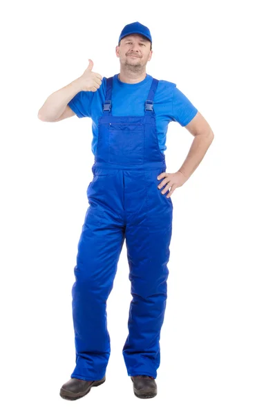 Man in blue overalls show ok sign. — Stock Photo, Image