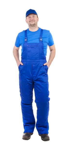 Man in blue overalls — Stock Photo, Image