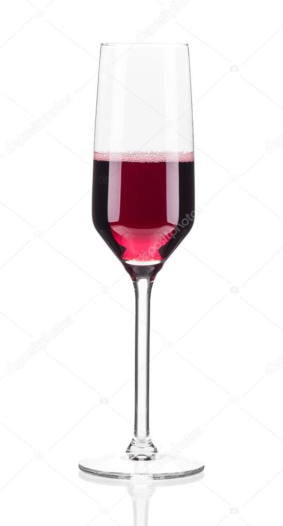 Close up of red champagne glass. 