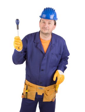 Worker in protective helmet with tools.