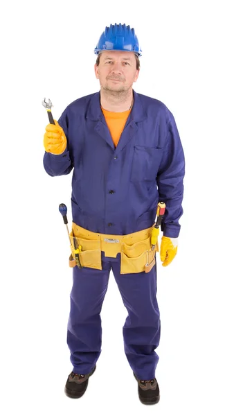 Worker in protective helmet with tools. — Stock Fotó