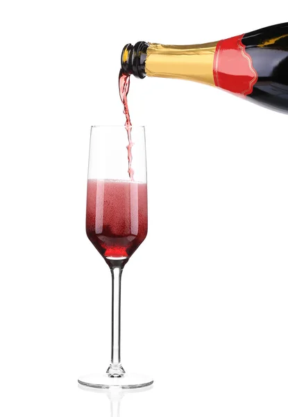 Red champagne pouring in a glass. — Stock Photo, Image