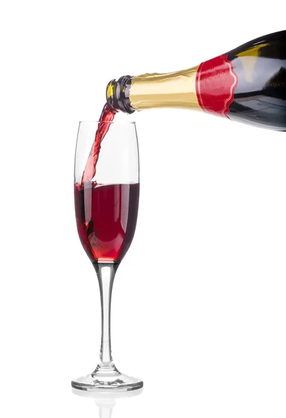 Red champagne pouring in a glass. — Stock Photo, Image