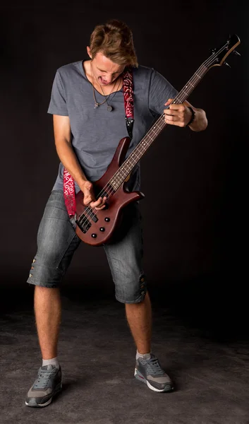 Bass guitarist player — Stock Photo, Image