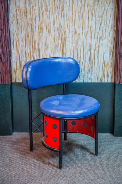 Modern unusual blue red stool — Stock Photo, Image