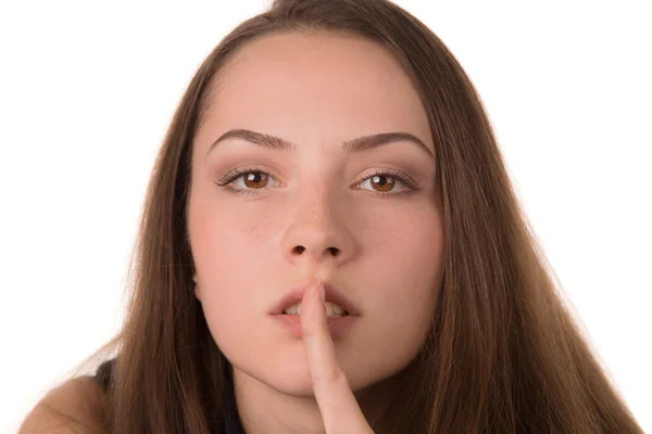 Frau mit Finger bittet um Schweigen — Stockfoto